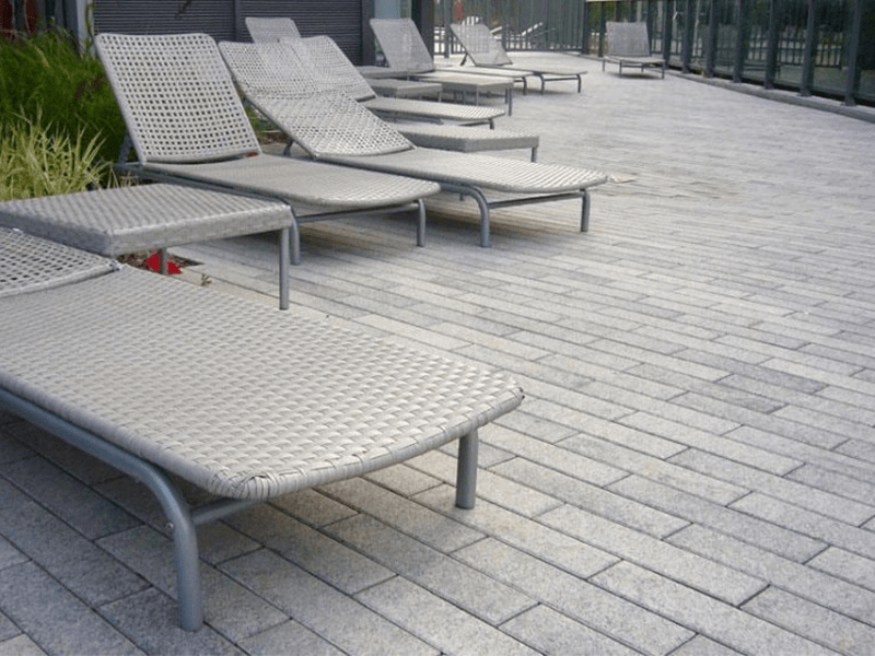 Professional headshot of a smiling bearded man with short red hair, wearing a blue collared shirt with the logo "Skyview Detroit" embroidered on it.