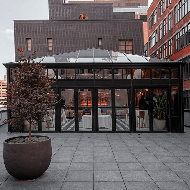 Custom glass conservatory at the Birdy Room at the Shinola Hotel in Downtown Detroit built by Skyview Detroit