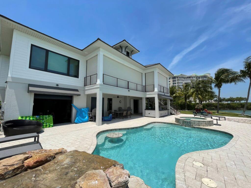 MagnaTrack hurricane screens on second story balcony