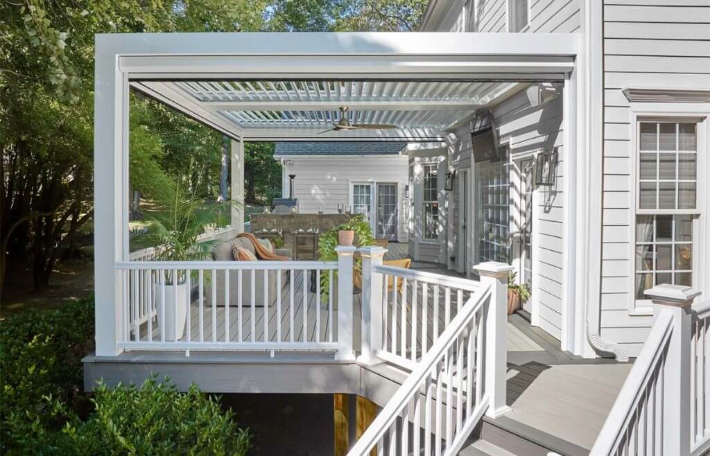 Two story wrap around TimberTech Deck with StruXure Pergola in Grosse Point, MI