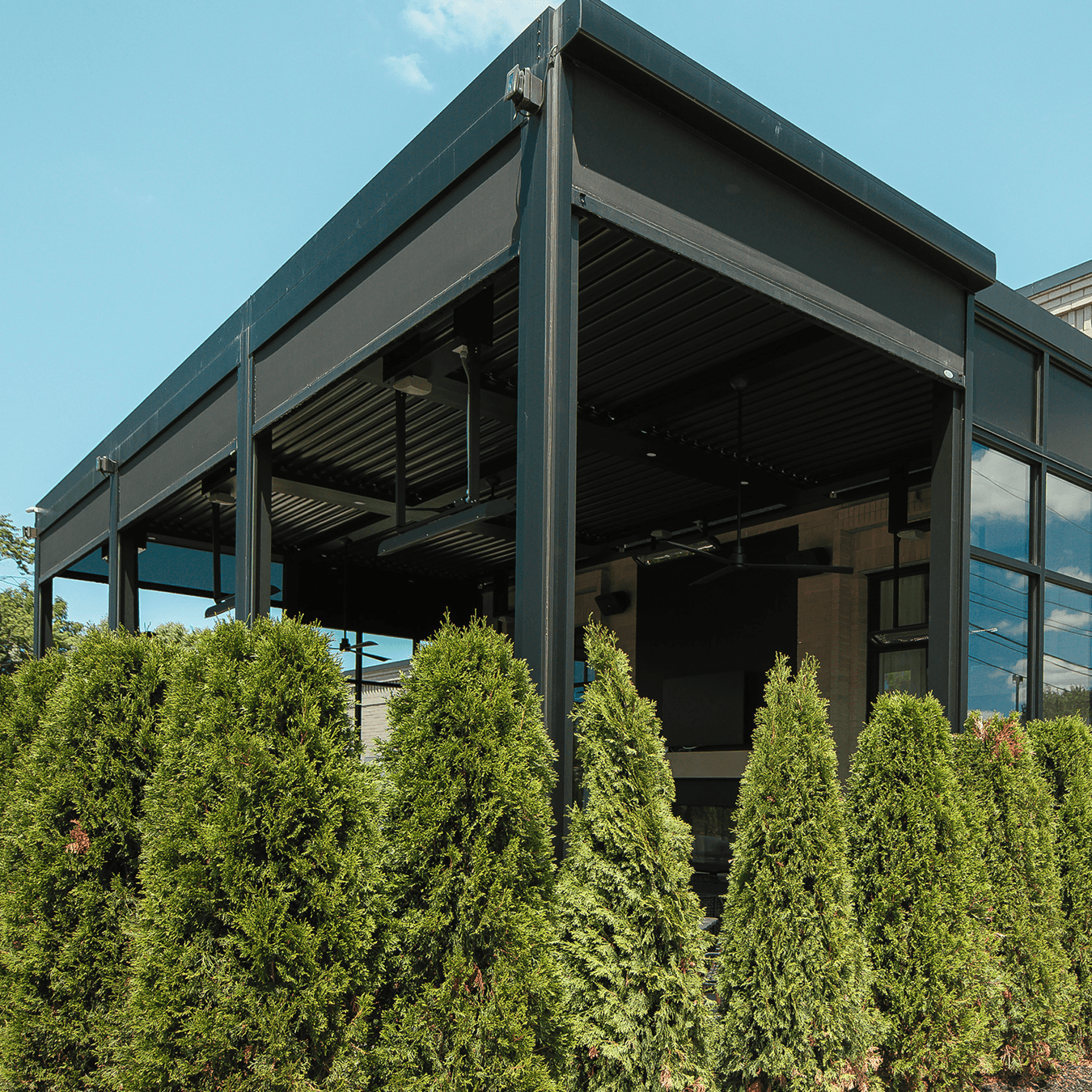 covered restaurant event space with pergola system