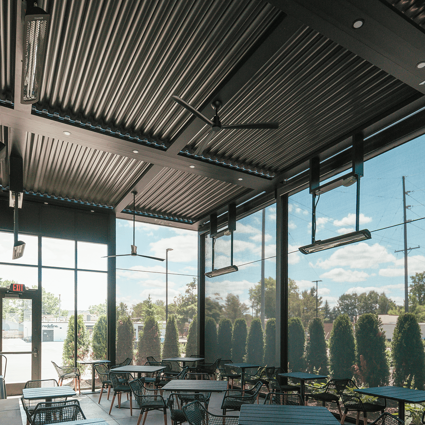 restaurant patio with MagnaTrack screens and heaters