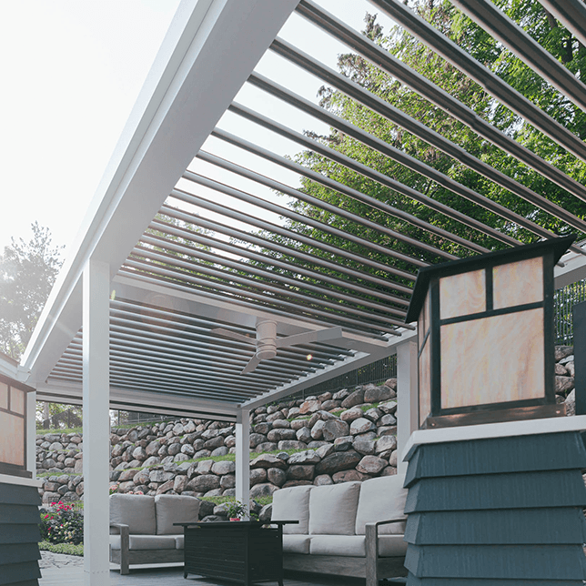 backyard pergola installation with adjustable louvers in Plymouth MI