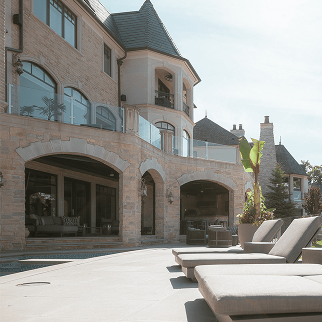 Dual motorized screens on luxury home lakefront in West Bloomfield MI built by Skyview Detroit