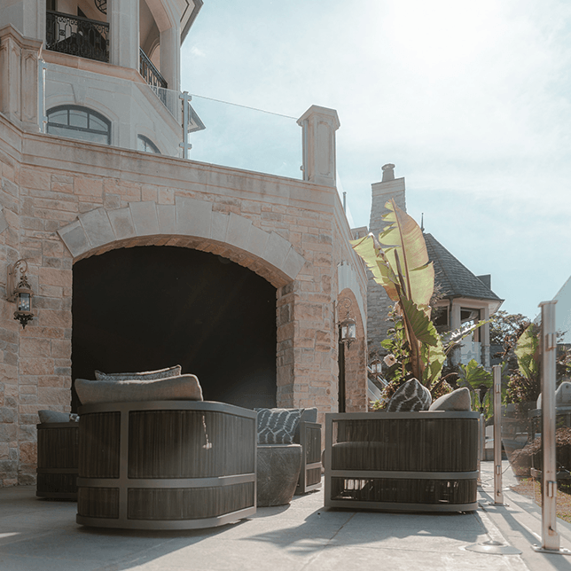 Dual motorized screens on luxury home lakefront in West Bloomfield MI built by Skyview Detroit