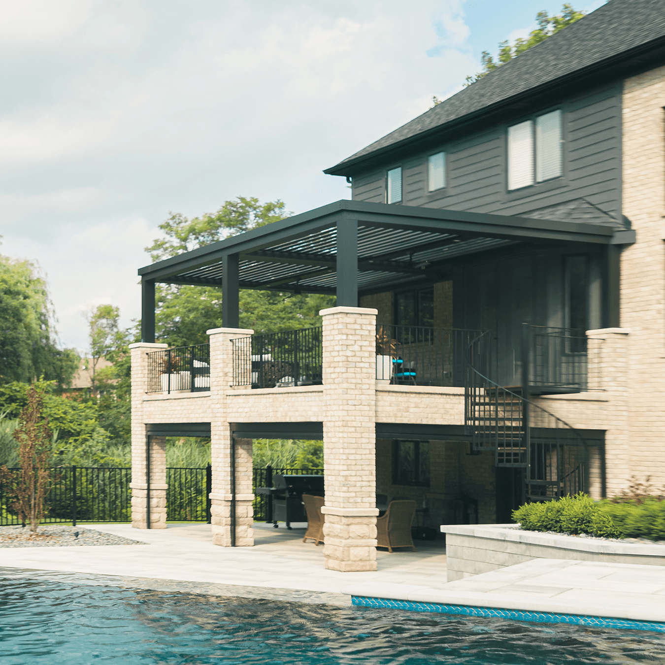 completed StruXure pergola systems and screened lower-level outdoor living space in Shelby Township Michigan