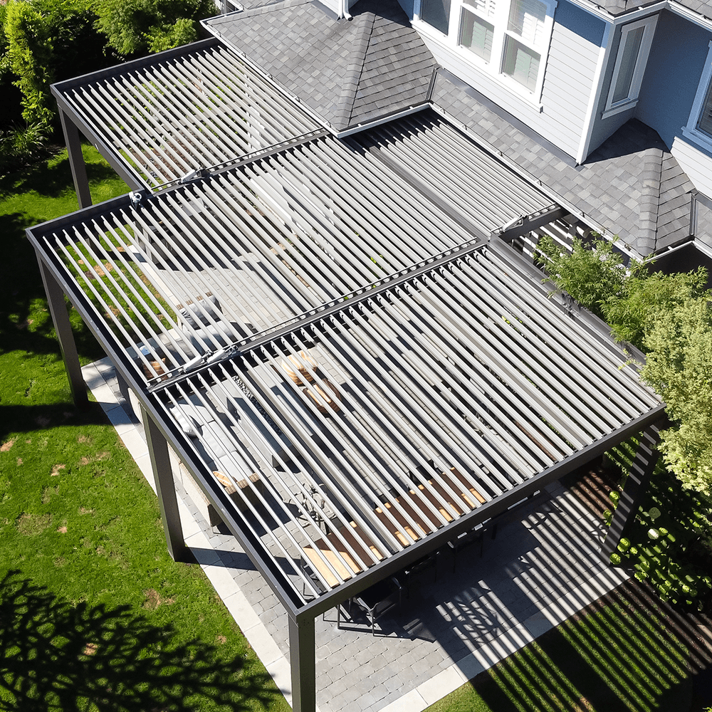 Louvered pergola on back patio of home