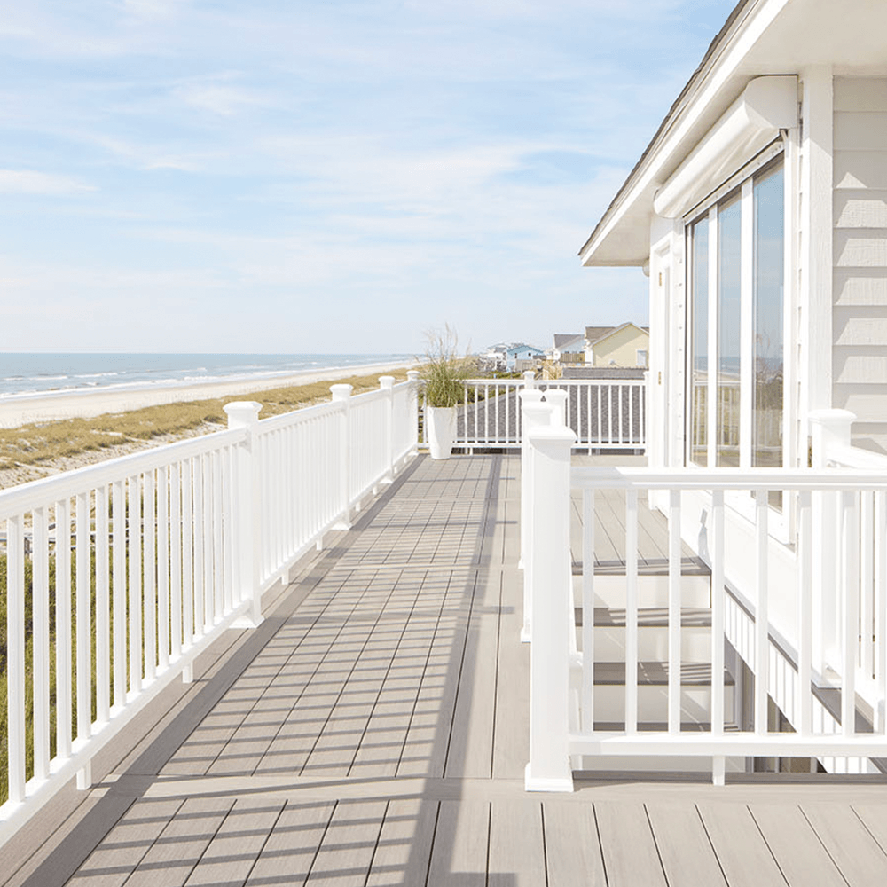 Beachfront property with a composite deck and railing