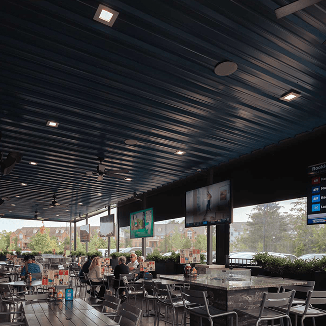 restaurant patio enclosed with MagnaTrack vinyl screens in Northville Township Michigan