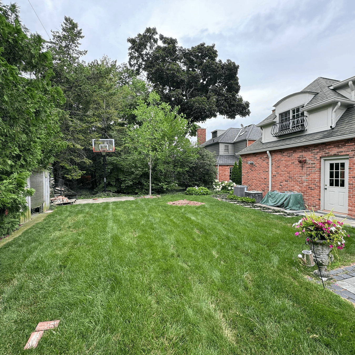 backyard before glass conservatory installation in Grosse Pointe Michigan