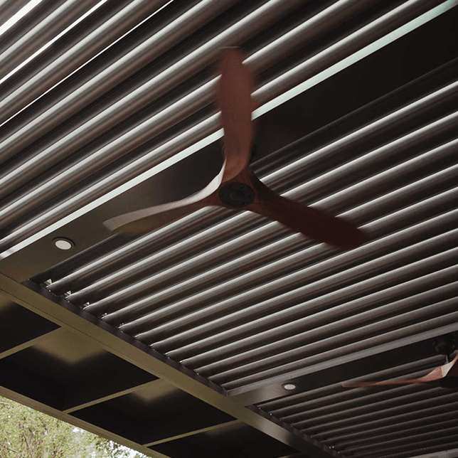 Modern backyard patio transformed with a StruXure pergola by Skyview Detroit