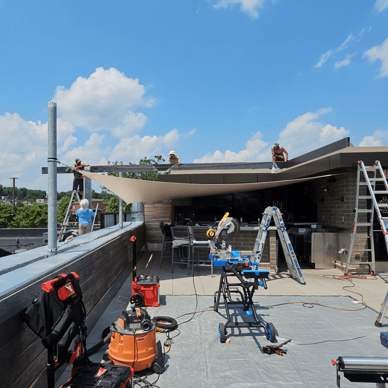 rooftop restaurant in Downtown Northville with temporary fabric canopy covering outdoor bar area