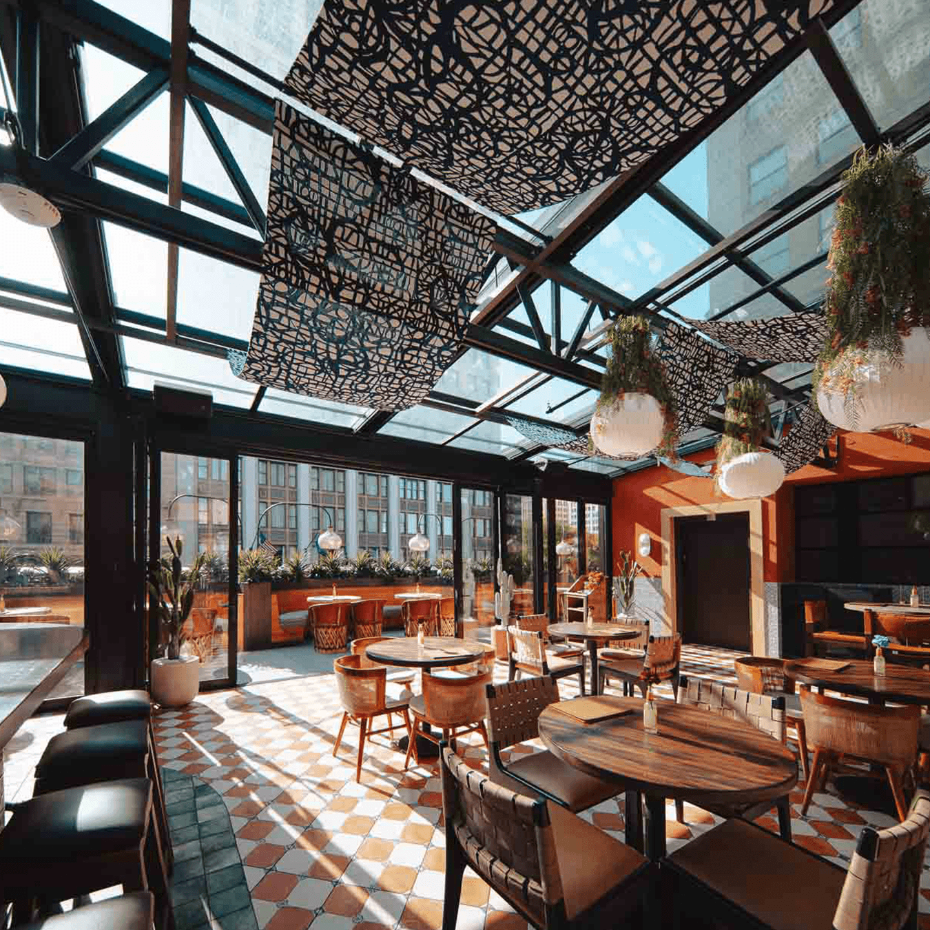 custom glass roof system installed at Gillys restaurant in downtown Detroit