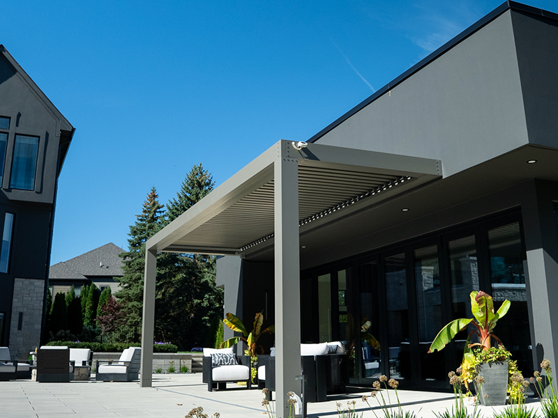 StruXure pergola installed on pool house in Rochester Michigan