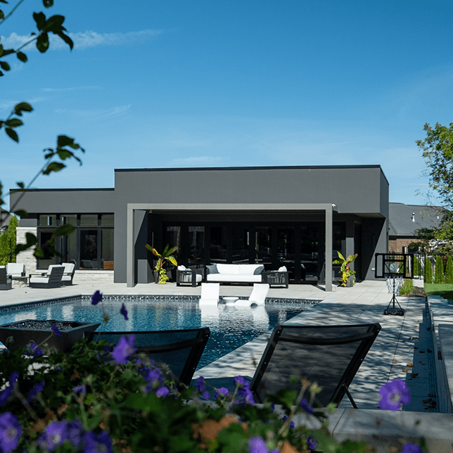 StruXure pergola installed on pool house in Rochester Michigan