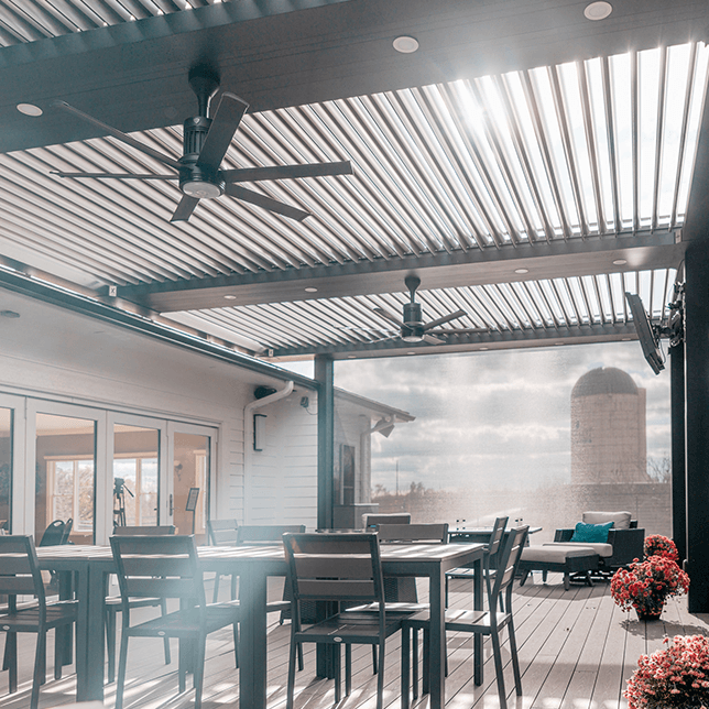 large deck with pergola and screens protecting from wind