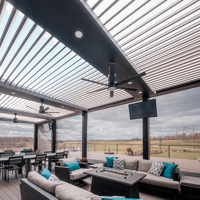 StruXure pergola with MagnaTrack screens on golf club deck in Ann Arbor Michigan