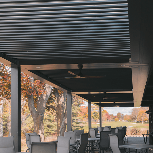 country club patio with StruXure pergola and outdoor dining