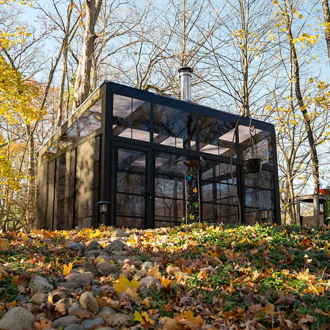 Outdoor retreat with polycarbonate roof and natural surroundings