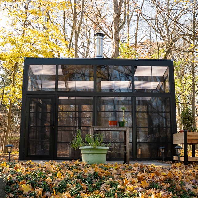Outdoor retreat with polycarbonate roof and natural surroundings